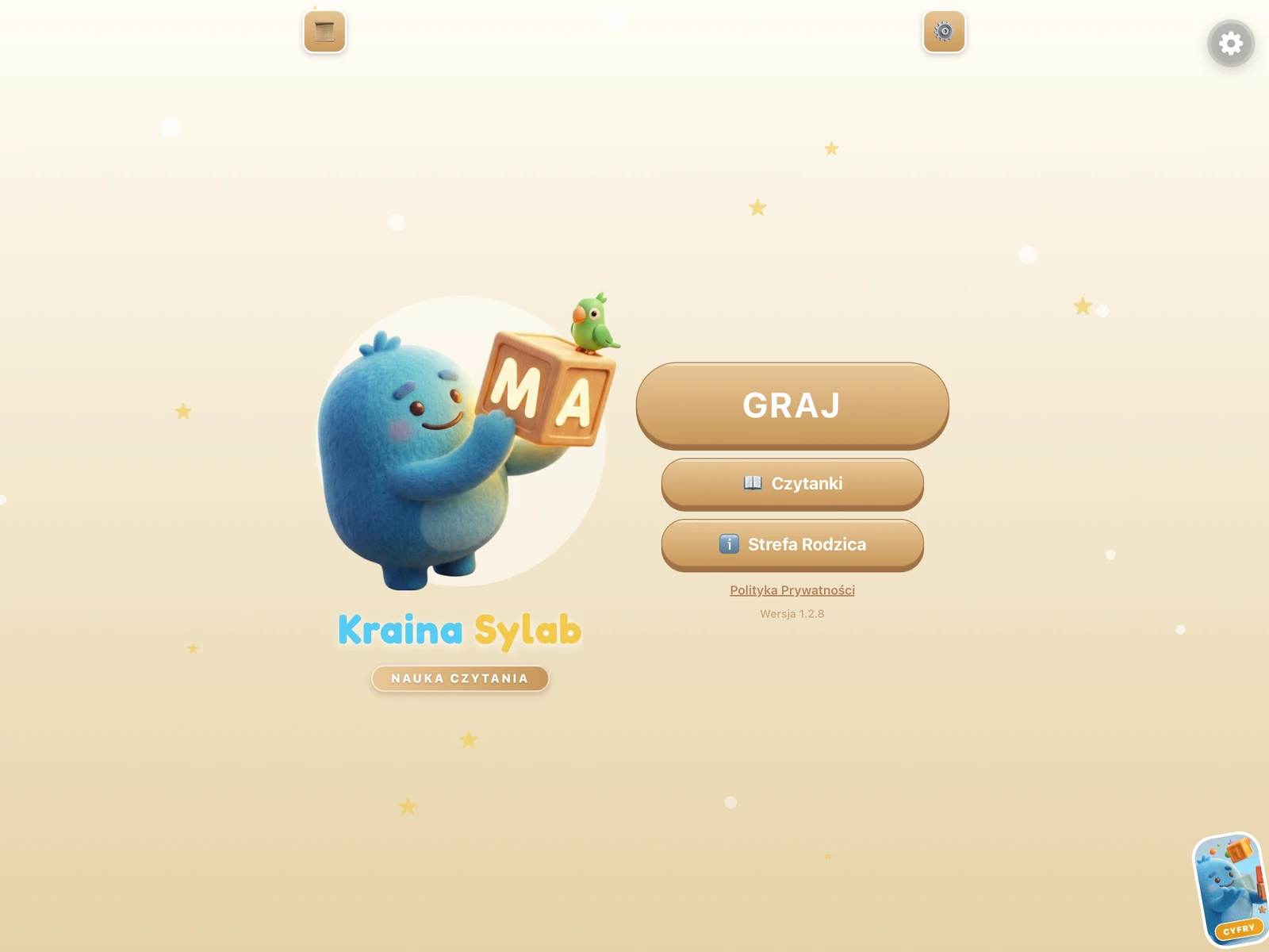 Ekran główny Krainy Sylab na tablecie z maskotką potworka i menu gry